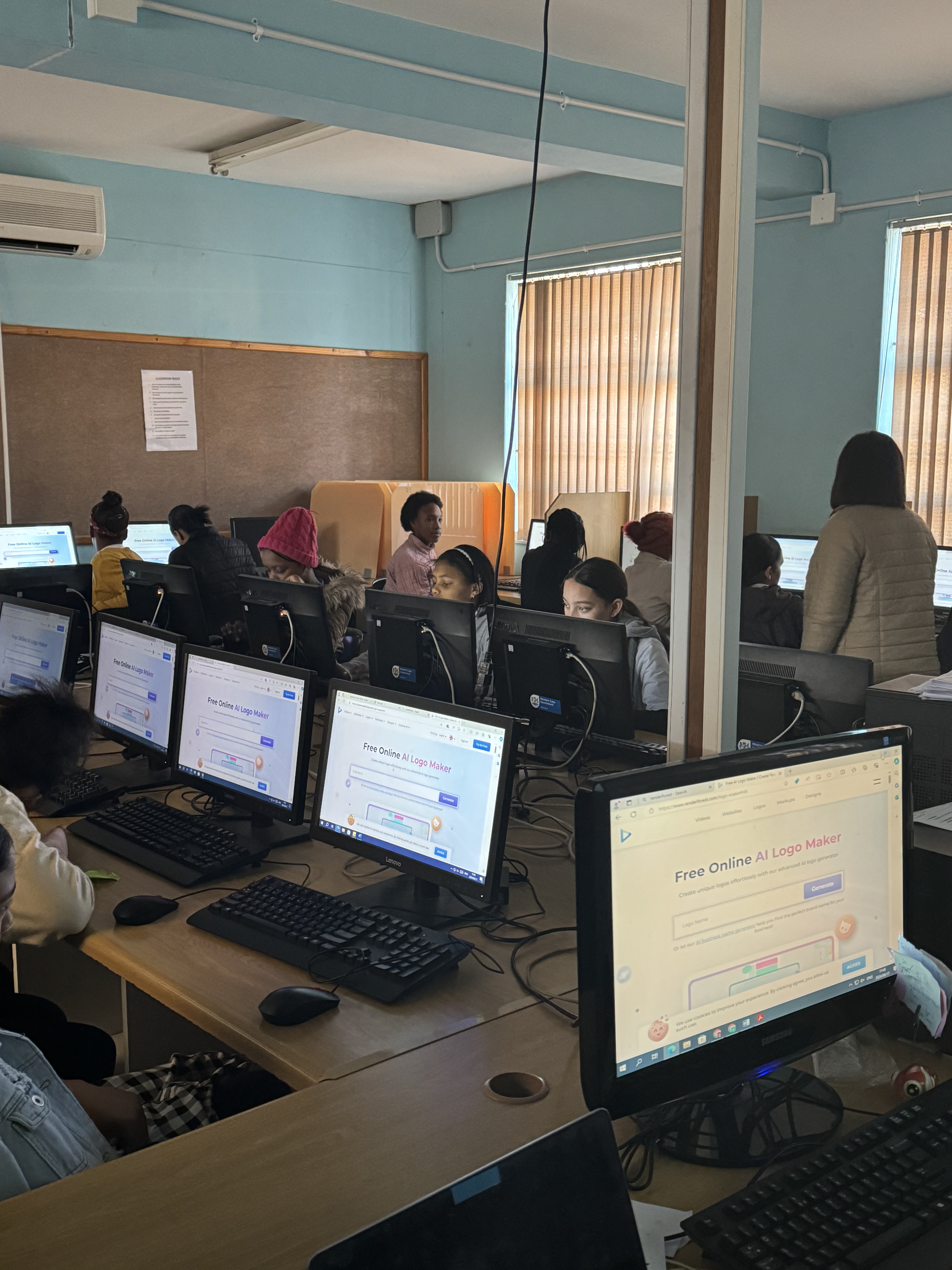 Girls learning technology skills in computer lab during Girls In STEAM program